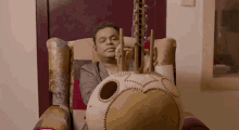Ar Rahman Super Singer GIF - Ar Rahman Super Singer Playing Kora GIFs