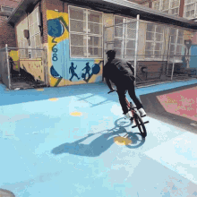 jump nigel sylvester bmx trick to the wall stunt