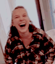 millie bobby brown laughing happy with friends thats funny