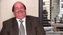 Chuckle - The Office GIF - The Office Kevin Malone Kevin GIFs