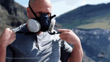 Put On Mask Nik Wallenda GIF - Put On Mask Nik Wallenda Volcano Live With Nik Wallenda GIFs
