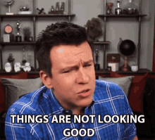 Things Are Not Looking Good Chuckle GIF - Things Are Not Looking Good Chuckle Smile GIFs