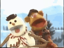 Fozzie Bear Snowman GIF - Fozzie Bear Snowman Muppet Family Christmas GIFs