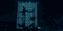 Projection On Building Alan Walker GIF - Projection On Building Alan Walker Time GIFs