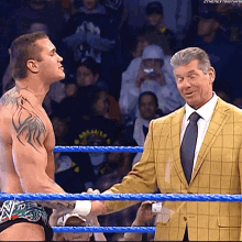 Vince Mc Mahon Randy Orton GIF - Vince Mc Mahon Randy Orton Shakes Hands GIFs