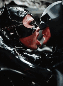 Cat Woman Batman GIF - Cat Woman Batman Lick GIFs