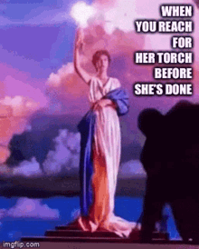 When You Reach For Torch Before Shes Done Smack GIF - When You Reach For Torch Before Shes Done Smack Lady Liberty GIFs