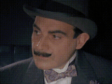 Poirot Charmant GIF - Poirot Charmant David Suchet GIFs