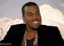 kanye laugh thinking serious mean
