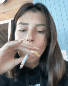 Asian Girl Smoking Weed