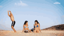 Somersault People Are Awesome GIF - Somersault People Are Awesome Flipping Over Two People GIFs