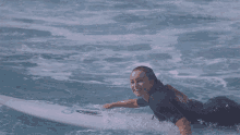 Im On My Surfboard Its Fun Surfing GIF - Im On My Surfboard Its Fun Surfing Paddling On My Surfboard GIFs