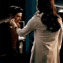 Snowbarry The Flash GIF - Snowbarry The Flash Treating Wounds GIFs