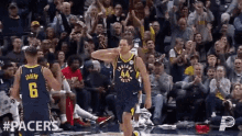 celebrating high five three bojan bogdanovic indiana pacers