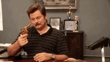 ron swanson parks and rec parks and recreation nick offerman gun