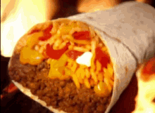 Taco Bell Beefy Crunch Burrito GIF - Taco Bell Beefy Crunch Burrito Flamin Hot Fritos GIFs
