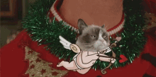 Grumpy Cat Is Grumpy GIF - Holidays Happy Holidays Christmas Sweater GIFs