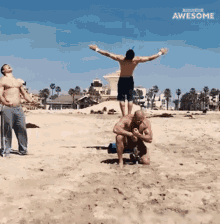 Backflip Over A Person People Are Awesome GIF - Backflip Over A Person People Are Awesome Tumbling On Sand GIFs