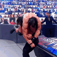 roman reigns samoan drop drew mc intyre announce table wwe roman reigns samoan drop drew mc intyre announce table wwe