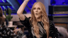 Celine Rocking It GIF - Wave Your Hands In The Air Celine Dion Rock It GIFs