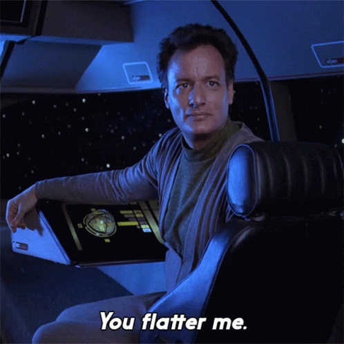 you-flatter-me-q-star-trek.gif