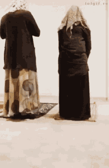 Ladies In Veil Praying GIF - Ladies In Veil Praying Shocked GIFs