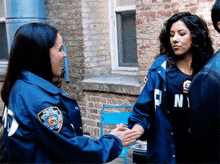 Brooklyn Nine Nine Amy And Rosa GIF - Brooklyn Nine Nine Amy And Rosa Secret Handshake GIFs