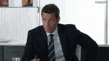 Squint GIF - Peter Hermann Charles Brooks Squint GIFs