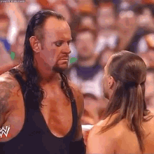 Shawn Michaels Undertaker GIF - Shawn Michaels Undertaker Throat Chop GIFs