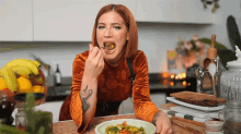 Taking A Bite Candice Hutchings GIF - Taking A Bite Candice Hutchings Edgy Veg GIFs