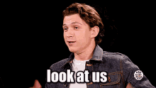 Tom Holland Hot Ones GIF - Tom Holland Hot Ones Paul Rudd Look At Us GIFs