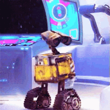 Wall E Have A Seat GIF - Wall E Have A Seat Sit Down GIFs