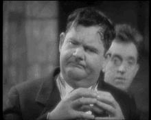 Laurel And Hardy Suspicious GIF - Laurel And Hardy Suspicious Condescending GIFs
