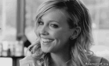 Flirty GIF - Katie Cassidy Tongue Out Wink GIFs
