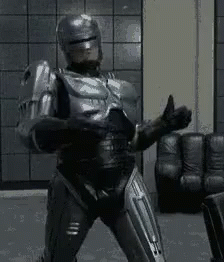 Robocop GIF - Robocop Fight Time Lets Move GIFs