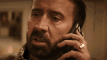 Im On The Phone Nick Cage GIF - Im On The Phone Nick Cage Nicolas Cage GIFs