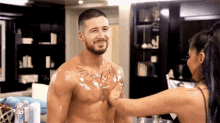 Touch Chest Oil GIF - Touch Chest Oil Apply Oil GIFs