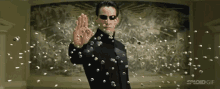Catching Bullets - The Matrix Reloaded GIF - The Matrix Bullets GIFs