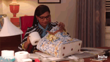 For The Road GIF - The Mindy Project Packing Toilet Paper GIFs