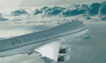 plane aeroplane peak trans clouds flight