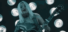 playing guitar alexi blue young and reckless performing feeling it