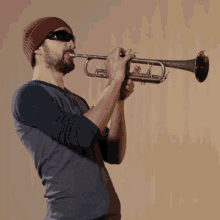 Playing Trombone Joe Penna GIF - Playing Trombone Joe Penna Mystery Guitar Man GIFs