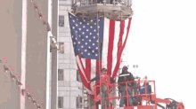 Workers Will Strategically Lift The Spire To The Top Of One World Trade Center. GIF - American Flag Unveiling World Trade Center GIFs