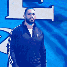 Roman Reigns Entrance GIF - Roman Reigns Entrance Tracksuit GIFs