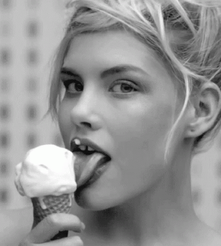 Ebony sexy lady eating ice cream