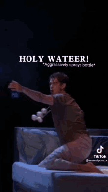 Andrew Garfield Holy Water GIF - Andrew Garfield Holy Water Spray GIFs