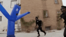 Police Wacky Waving Inflatable Tube Man GIF - Police Wacky Waving Inflatable Tube Man Tube Man GIFs