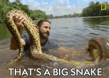 thats a big snake primal survivor5 careful handling a snake river