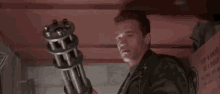 Minigun Arnold GIF - Minigun Arnold Schwarzenegger GIFs