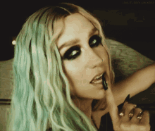 Kesha GIF - Finger Bite Kesha Sexy GIFs